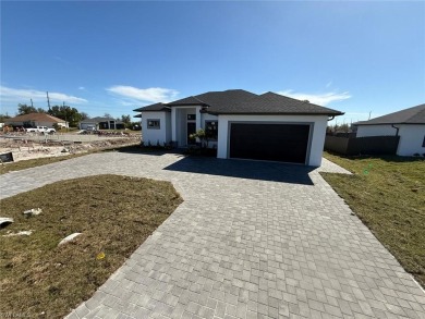 Welcome to a breathtaking new construction single-family home on Palmetto-Pine Country Club in Florida - for sale on GolfHomes.com, golf home, golf lot