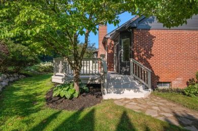 Discover unparalleled elegance in this brick colonial nestled on Beacon Hill Golf Club in Michigan - for sale on GolfHomes.com, golf home, golf lot