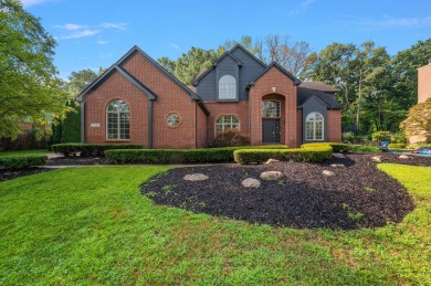 Discover unparalleled elegance in this brick colonial nestled on Beacon Hill Golf Club in Michigan - for sale on GolfHomes.com, golf home, golf lot