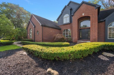 Discover unparalleled elegance in this brick colonial nestled on Beacon Hill Golf Club in Michigan - for sale on GolfHomes.com, golf home, golf lot