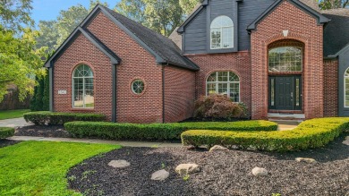 Discover unparalleled elegance in this brick colonial nestled on Beacon Hill Golf Club in Michigan - for sale on GolfHomes.com, golf home, golf lot