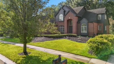 Discover unparalleled elegance in this brick colonial nestled on Beacon Hill Golf Club in Michigan - for sale on GolfHomes.com, golf home, golf lot