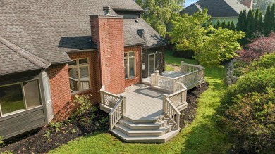 Discover unparalleled elegance in this brick colonial nestled on Beacon Hill Golf Club in Michigan - for sale on GolfHomes.com, golf home, golf lot