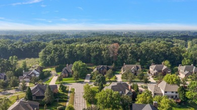 Discover unparalleled elegance in this brick colonial nestled on Beacon Hill Golf Club in Michigan - for sale on GolfHomes.com, golf home, golf lot