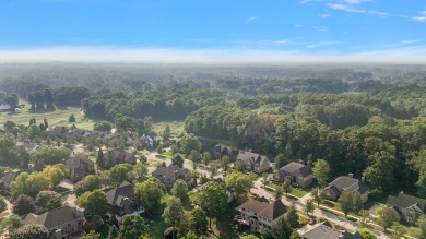 Discover unparalleled elegance in this brick colonial nestled on Beacon Hill Golf Club in Michigan - for sale on GolfHomes.com, golf home, golf lot