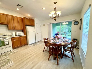 Under contract-accepting backup offers. Beautiful 3/2/2 with a on Kingsway Country Club in Florida - for sale on GolfHomes.com, golf home, golf lot