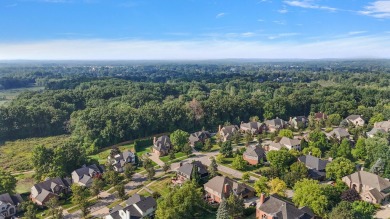 Discover unparalleled elegance in this brick colonial nestled on Beacon Hill Golf Club in Michigan - for sale on GolfHomes.com, golf home, golf lot