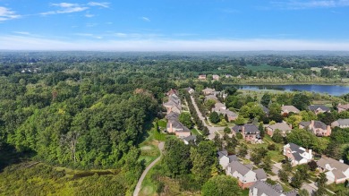 Discover unparalleled elegance in this brick colonial nestled on Beacon Hill Golf Club in Michigan - for sale on GolfHomes.com, golf home, golf lot