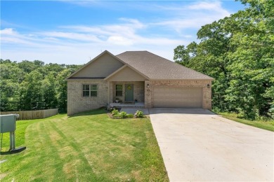 This home is a great home for the outdoor enthusiast! Mountain on Bella Vista - Metfield Golf Complex and Country Club in Arkansas - for sale on GolfHomes.com, golf home, golf lot