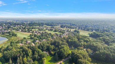 Discover unparalleled elegance in this brick colonial nestled on Beacon Hill Golf Club in Michigan - for sale on GolfHomes.com, golf home, golf lot