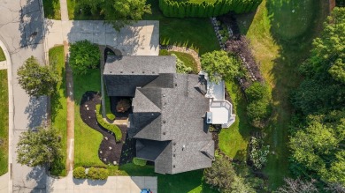 Discover unparalleled elegance in this brick colonial nestled on Beacon Hill Golf Club in Michigan - for sale on GolfHomes.com, golf home, golf lot