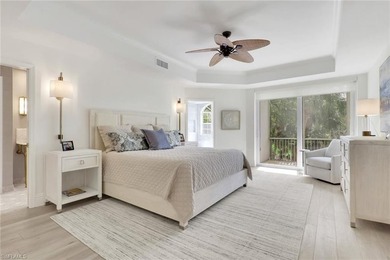 Welcome to this gracious, fully reimagined 2-bedroom plus 2 on Club at Pelican Bay Golf Course in Florida - for sale on GolfHomes.com, golf home, golf lot