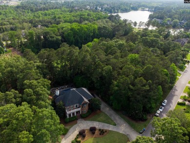 Stunning custom home located on the Tom Fazio Championship Golf on The Members Club At Woodcreek in South Carolina - for sale on GolfHomes.com, golf home, golf lot