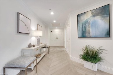 Welcome to this gracious, fully reimagined 2-bedroom plus 2 on Club at Pelican Bay Golf Course in Florida - for sale on GolfHomes.com, golf home, golf lot