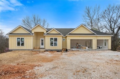 Welcome to this exquisite 3,343 sqft home, offering 5 spacious on Big Sugar Golf Club in Arkansas - for sale on GolfHomes.com, golf home, golf lot