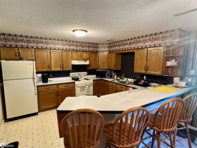 Nice family home, located near Municipal Golf Course. Large yard on Carroll Municipal Golf Course in Iowa - for sale on GolfHomes.com, golf home, golf lot
