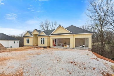 Welcome to this exquisite 3,343 sqft home, offering 5 spacious on Big Sugar Golf Club in Arkansas - for sale on GolfHomes.com, golf home, golf lot