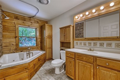 Welcome to 142 Golden Mist Ct! A well-built cabin located at the on Sapphire National Golf Club in North Carolina - for sale on GolfHomes.com, golf home, golf lot