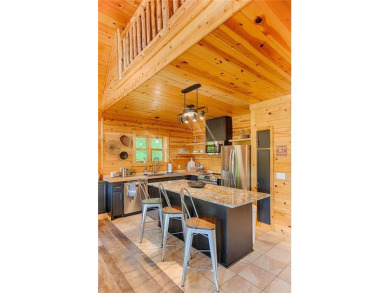 Fantastic 5 bed, 3 bath log home backing onto the scenic 11th on Hardwoods Golf Club At Mille Lacs in Minnesota - for sale on GolfHomes.com, golf home, golf lot