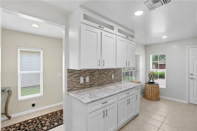 Experience the best of carefree living in this beautifully on Panther Run Golf Club in Florida - for sale on GolfHomes.com, golf home, golf lot