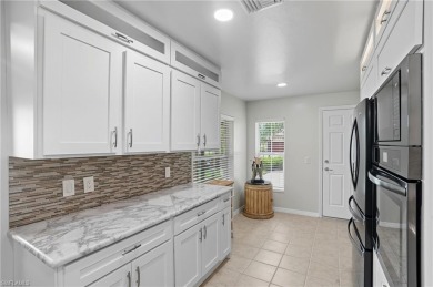 Experience the best of carefree living in this beautifully on Panther Run Golf Club in Florida - for sale on GolfHomes.com, golf home, golf lot