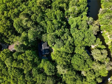 Welcome to 142 Golden Mist Ct! A well-built cabin located at the on Sapphire National Golf Club in North Carolina - for sale on GolfHomes.com, golf home, golf lot