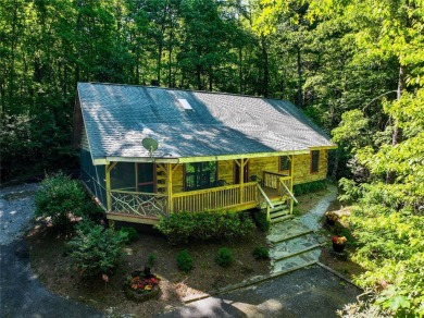 Welcome to 142 Golden Mist Ct! A well-built cabin located at the on Sapphire National Golf Club in North Carolina - for sale on GolfHomes.com, golf home, golf lot