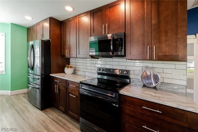 Welcome to this truly completely renovated Laconia model in the on Herons Glen Golf and Country Club in Florida - for sale on GolfHomes.com, golf home, golf lot