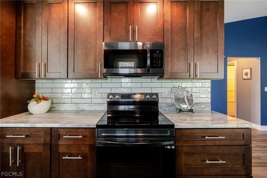 Welcome to this truly completely renovated Laconia model in the on Herons Glen Golf and Country Club in Florida - for sale on GolfHomes.com, golf home, golf lot