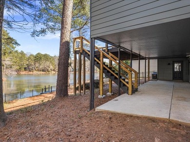 Welcome to 510 Wayt Rd, a beautifully reimagined home nestled in on Horseshoe Bend Country Club in Georgia - for sale on GolfHomes.com, golf home, golf lot