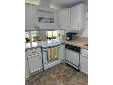 Manufactured Home on Leased Land with Lot Rent. Nestled in the on Whisperwood Golf Course in Florida - for sale on GolfHomes.com, golf home, golf lot