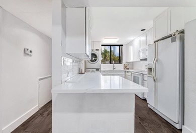 Beautiful and completely remodeled corner unit townhouse with on Fountains Golf and Country Club in Florida - for sale on GolfHomes.com, golf home, golf lot