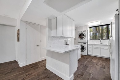 Beautiful and completely remodeled corner unit townhouse with on Fountains Golf and Country Club in Florida - for sale on GolfHomes.com, golf home, golf lot