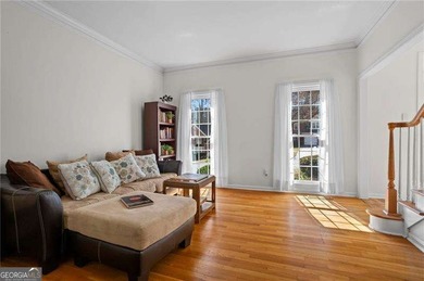 Welcome home to this timeless brick traditional nestled at the on Brookstone Golf and Country Club in Georgia - for sale on GolfHomes.com, golf home, golf lot