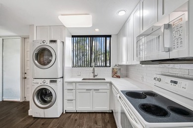 Beautiful and completely remodeled corner unit townhouse with on Fountains Golf and Country Club in Florida - for sale on GolfHomes.com, golf home, golf lot