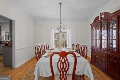 Welcome home to this timeless brick traditional nestled at the on Brookstone Golf and Country Club in Georgia - for sale on GolfHomes.com, golf home, golf lot