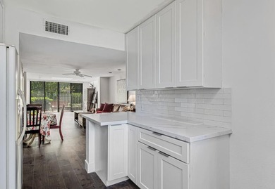 Beautiful and completely remodeled corner unit townhouse with on Fountains Golf and Country Club in Florida - for sale on GolfHomes.com, golf home, golf lot