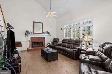 Welcome home to this timeless brick traditional nestled at the on Brookstone Golf and Country Club in Georgia - for sale on GolfHomes.com, golf home, golf lot