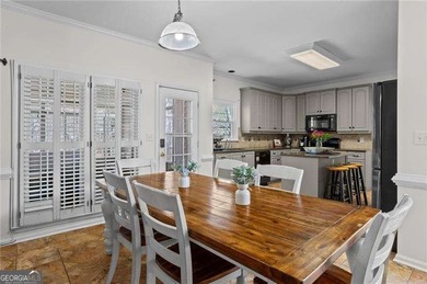 Welcome home to this timeless brick traditional nestled at the on Brookstone Golf and Country Club in Georgia - for sale on GolfHomes.com, golf home, golf lot