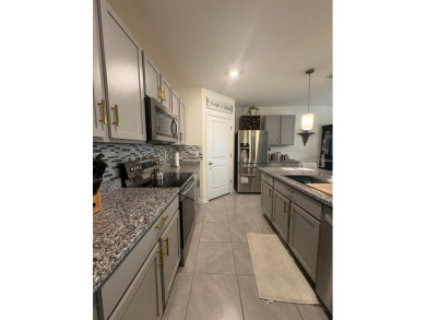 Enjoy peaceful golf course views in this like-new 4-bedroom on Lake Diamond Golf and Country Club in Florida - for sale on GolfHomes.com, golf home, golf lot