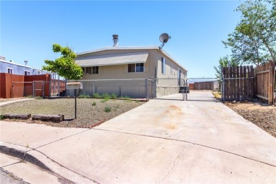 This 3-bedroom, 2-bath home offers 1,380 sq ft on a 6,811 sq ft on Green Tree Golf Course in California - for sale on GolfHomes.com, golf home, golf lot