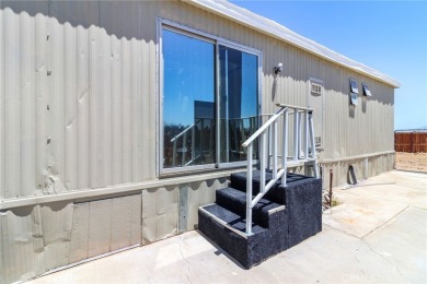 This 3-bedroom, 2-bath home offers 1,380 sq ft on a 6,811 sq ft on Green Tree Golf Course in California - for sale on GolfHomes.com, golf home, golf lot
