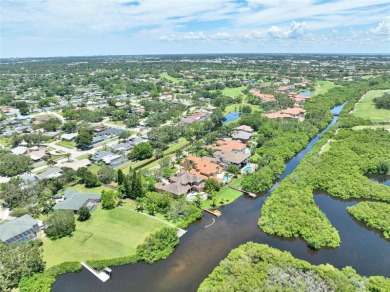 Welcome to this magnificent 2003-built executive home, perfectly on Bayou Golf Club in Florida - for sale on GolfHomes.com, golf home, golf lot
