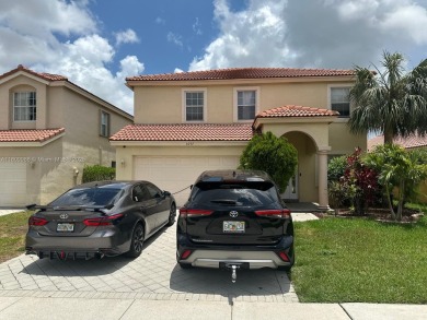 Beautiful lakefront single-family home in the sought-after Grand on Palm Beach Polo and Country Club in Florida - for sale on GolfHomes.com, golf home, golf lot