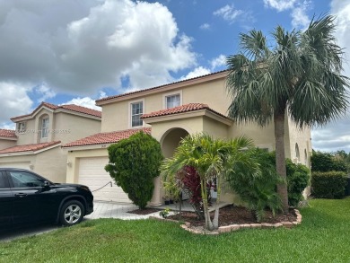 Beautiful lakefront single-family home in the sought-after Grand on Palm Beach Polo and Country Club in Florida - for sale on GolfHomes.com, golf home, golf lot