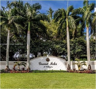 Beautiful lakefront single-family home in the sought-after Grand on Palm Beach Polo and Country Club in Florida - for sale on GolfHomes.com, golf home, golf lot