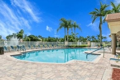 Beautiful lakefront single-family home in the sought-after Grand on Palm Beach Polo and Country Club in Florida - for sale on GolfHomes.com, golf home, golf lot