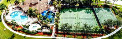 Beautiful lakefront single-family home in the sought-after Grand on Palm Beach Polo and Country Club in Florida - for sale on GolfHomes.com, golf home, golf lot