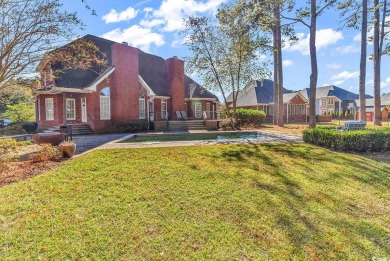 Surrounded by lush greenery and the quiet peacefulness that is on Myrtlewood Golf Course and Club  in South Carolina - for sale on GolfHomes.com, golf home, golf lot