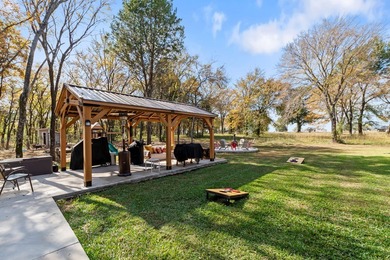 Stunning 2023 custom one-story home on a beautifully treed on Cedar Creek Country Club in Texas - for sale on GolfHomes.com, golf home, golf lot